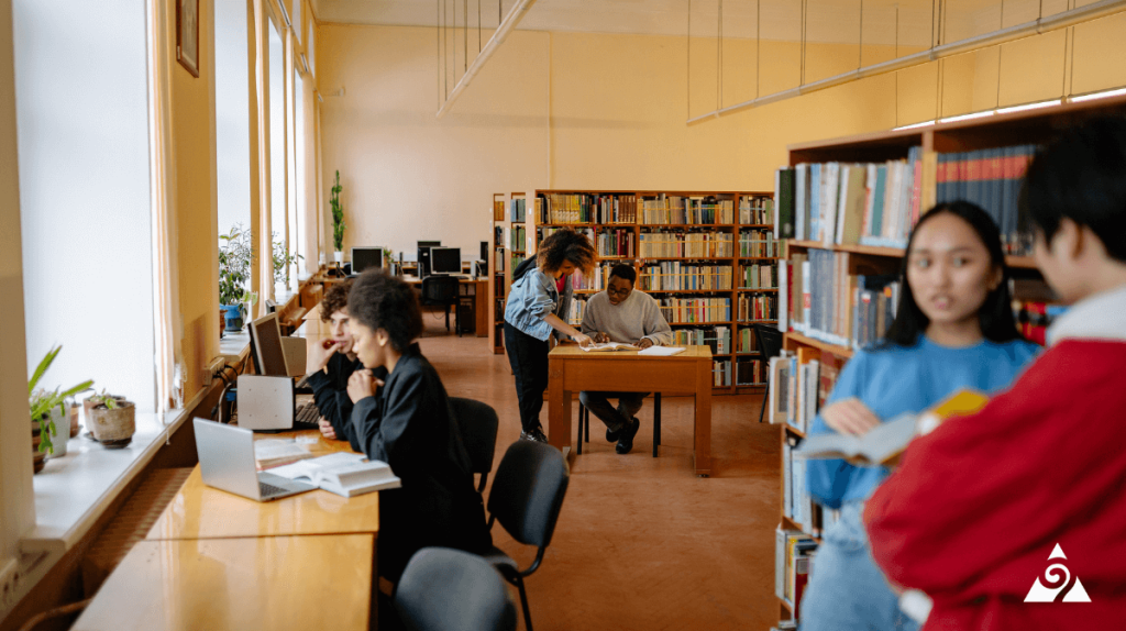 college students studying in a library